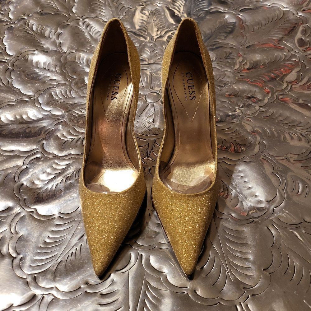 Guess heels with leather bottoms ,heels have some slight imperfections,size7&1/2